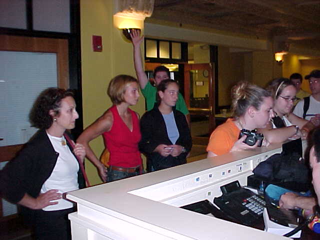 This is Caleb (hand up, back row) as Elisabeth gets checked out.